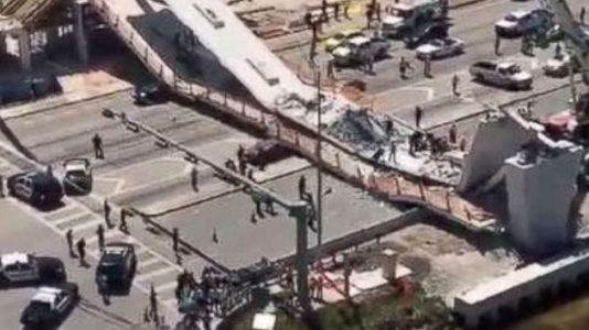 At least four killed after pedestrian bridge at Florida college collapses