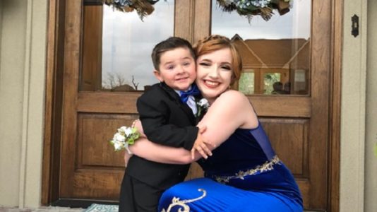 Adorable 2-year-old stands in for his Marine brother in viral prom photos