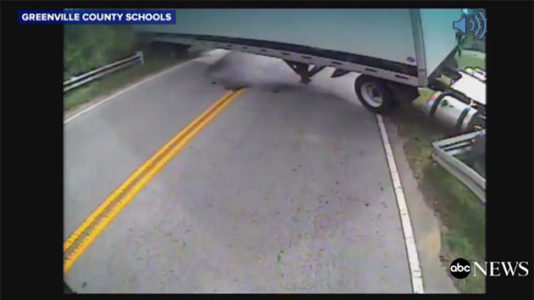 Driver, aide hailed as heroes after bus carrying special needs students hit by tractor-trailer