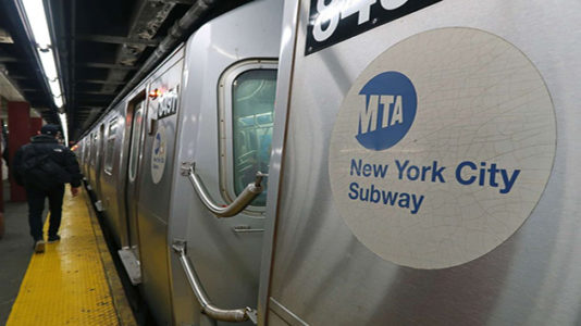 Pit bull attacks woman on subway after altercation