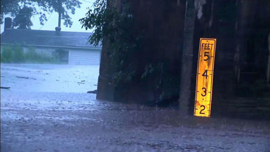 Three people swept away in floodwaters remain missing amid heavy rain in Virginia