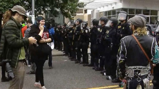 Federal officers clearing out Occupy ICE encampment in Portland