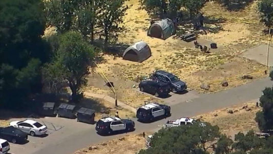 Dad mysteriously shot dead while camping with his 2 young kids