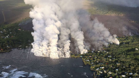 Lava flowing faster and hotter than ever as rescuers search for those trapped by the magma
