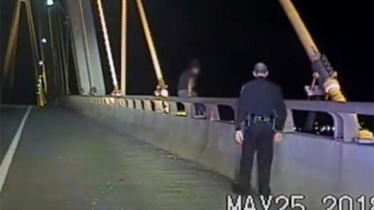 Police snatch woman from the edge of 180-foot Texas bridge known for suicides