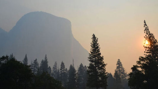 California firefighters struggle to contain deadly, rapidly growing wildfire