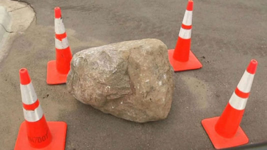 Mother, daughter killed when 800-pound boulder fell off truck, smashed their car; driver in custody: Police