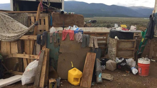 Investigators working to identify remains found at squalid New Mexico compound