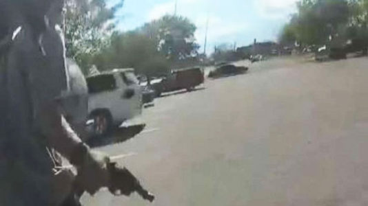 Body cam video shows alleged shoplifter shooting at police in Walmart parking lot