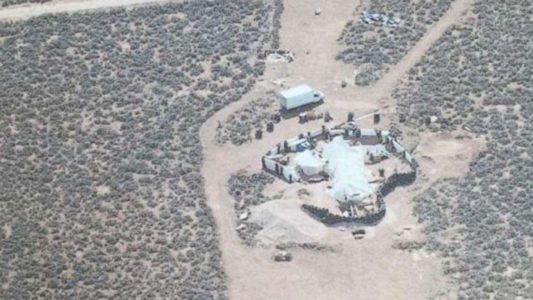 Judge dismisses child neglect charges against 3 adults found on remote New Mexico compound