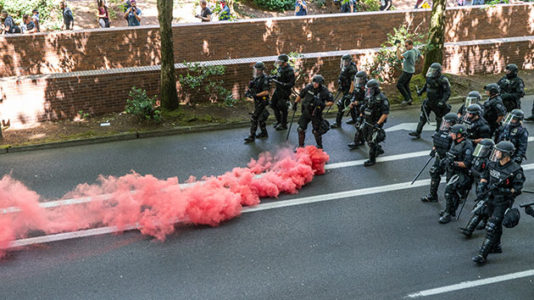 Portland protesters clash with police, each other in dueling rallies