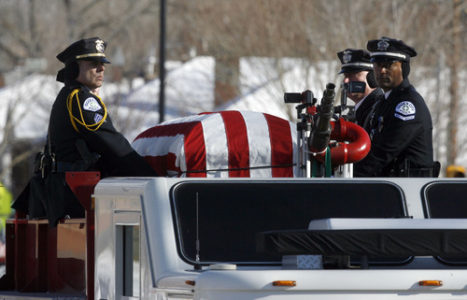 Francisco Kjolseth  |  The Salt Lake Tribune
Officers ride alongside the casket of slain Ogden police Officer Jared Francom as thousands turn up to pay their respects along the funeral procession route in Ogden on Wednesday, January 11, 2012.