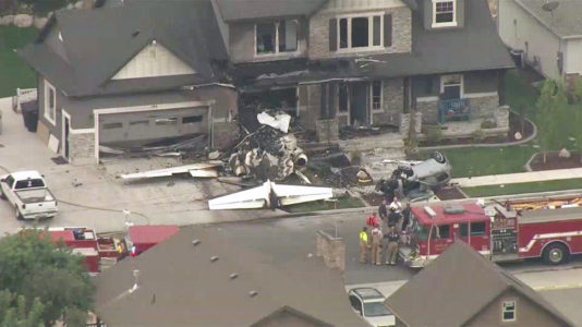 The scene where a plane crashed into a home in Payson, Utah, on August 13, 2013.