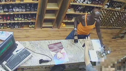 Police search for suspect seen tossing wine bottles in violent New York City robberies