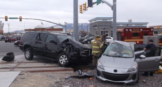 3-Vehicle Crash Wedges Pickup Between Tree and Delivery Truck, Injures One