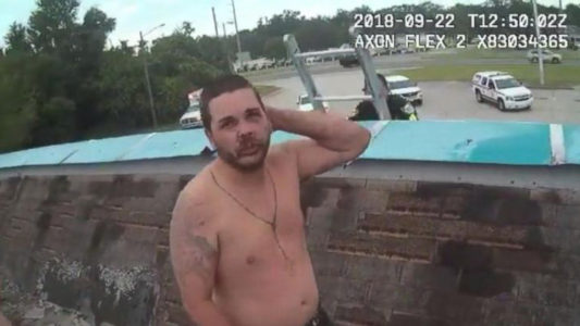 Shirtless burglar arrested on roof of business he was trying to rob, authorities say