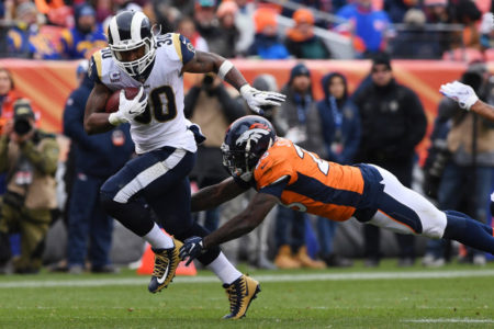 DENVER, CO - OCTOBER 14: Todd Gurley (30) of the Los Angeles Rams evades a tackle by Darian Stewart (26) of the Denver Broncos during the third quarter. The Denver Broncos hosted the Los Angelos Rams at Broncos Stadium at Mile High in Denver, Colorado on Sunday, October 14, 2018. (Photo by Joe Amon/The Denver Post)