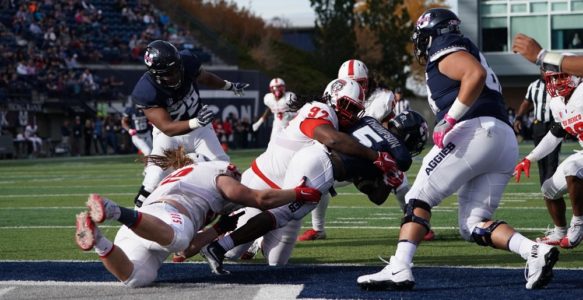 Love has big first half, Utah State defeats New Mexico 61-19