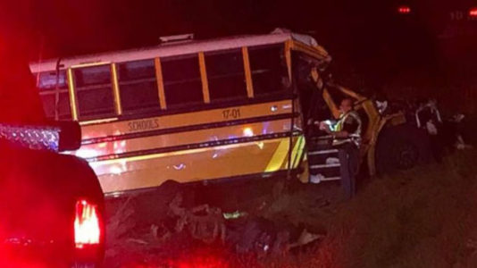 One killed, elevent hurt when Alabama school bus collides with car