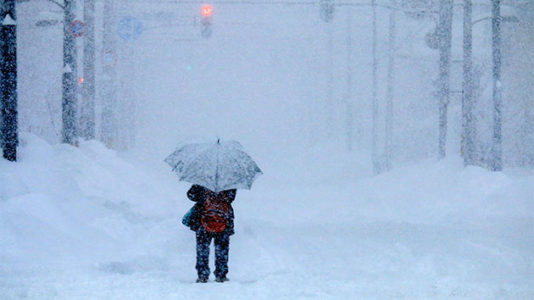Snowstorm causing headaches in Midwest on one of busiest travel days of year