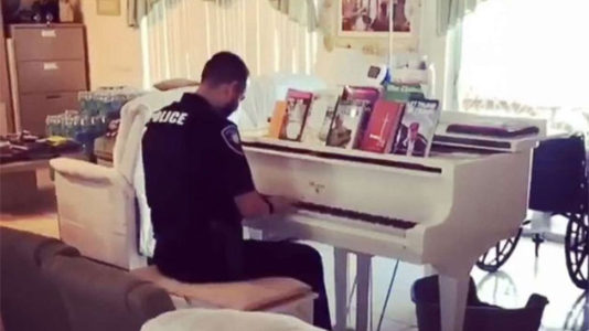 Police officer plays piano during call to assist elderly couple