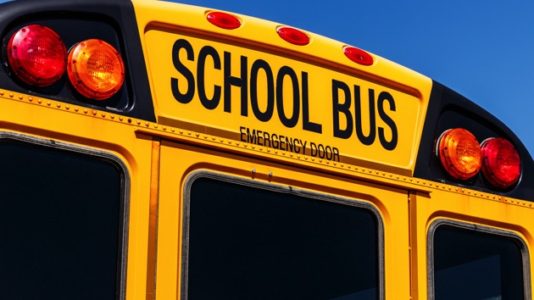 Teen boy killed in school bus crash while headed to Christmas musical; no seat belts on board