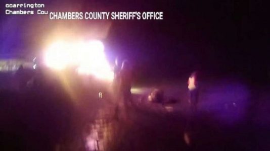 Unconscious man pulled from burning car, thrown in puddle by quick-thinking officers