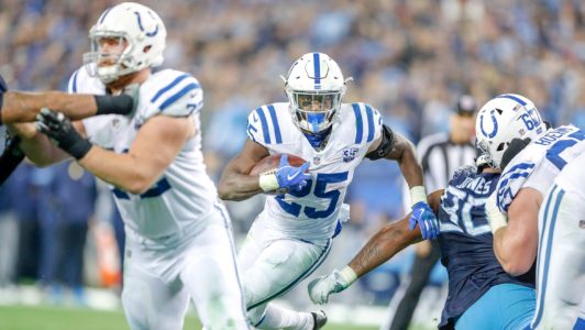 Colts earn playoff spot; Luck remains perfect vs. Titans