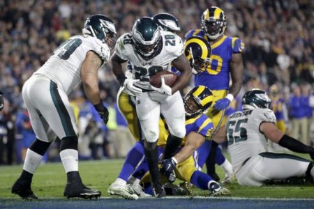 Back in the game: Foles leads Eagles past Rams 30-23