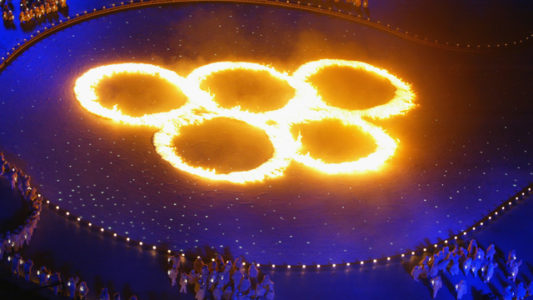 SALT LAKE CITY, UT - FEBRUARY 8:  The Olympic Rings in flames during the Opening Ceremony of the Salt Lake City Winter Olympic Games at the Rice-Eccles Olympic Stadium in Salt Lake City, Utah on February 8, 2002. (Photo by Donald Miralle/Getty Images)