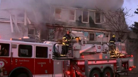 Massachusetts firefighter dies while battling huge blaze