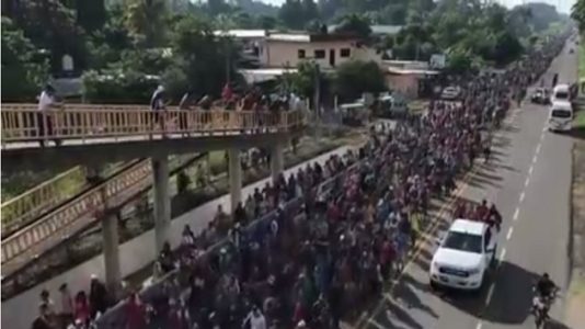 US fires tear gas into Mexico as migrants attempt to cross border into San Diego