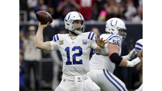 Indianapolis Colts quarterback Andrew Luck (12) throws against the Houston Texans during the first half of an NFL wild card playoff football game, Saturday, Jan. 5, 2019, in Houston. (AP Photo/Michael Wyke)