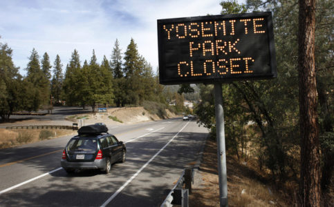 Sign on Rt. 41 in Oakhurst notifying travelers that Yosemite Park is closed Tuesday, Oct. 1, 2013. The shutdown of the federal government overnight meant that some federal employees, such as rangers who staff national parks, were furloughed as their positions are considered 'non-essential.' The shutdown means anyone who is in Yosemite National Park has 48 hours to leave if the House and Senate can't come to an agreement on a funding bill that puts the federal government back in business. (Patrick Tehan/Bay Area News Group)