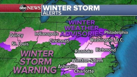 Heavy snow buries Midwest with up to a foot possible in Mid-Atlantic