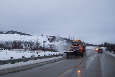 Utah snowfall slows traffic, closes schools