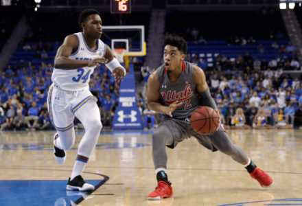 Utah guard Sedrick Barefield (2) dribbles next to UCLA guard David Singleton (34) during the first half of an NCAA college basketball game Saturday, Feb. 9, 2019, in Los Angeles. (AP Photo/Marcio Jose Sanchez)
