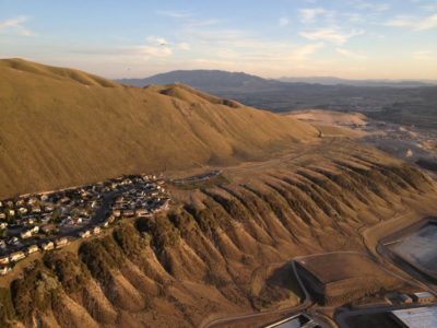 Man hurt when paraglider crashes into hill