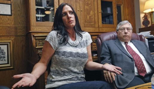 Utah school district settles suit over teen dragged by a bus