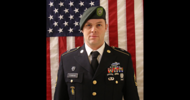 Flags placed at shop owned by fallen soldier’s family