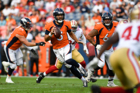DENVER, CO - AUGUST 19: Joe Flacco (5) of the Denver Broncos evades pressure against the San Francisco 49ers during the first quarter on Monday, August 19, 2019. (Photo by AAron Ontiveroz/The Denver Post)