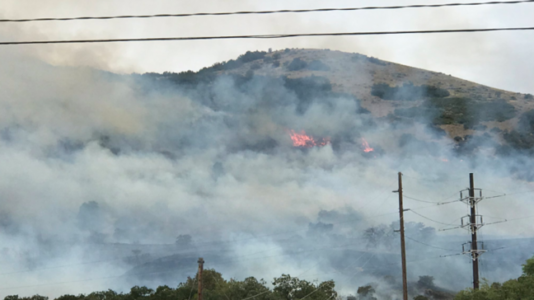 Officials say wildfire burning near Layton is 10% contained