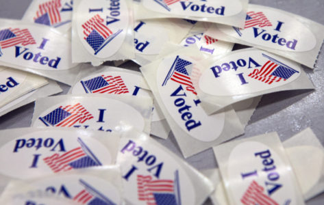 "I Voted" stickers are seen for voters after they cast their ballots at Oakdale Elementary School in Frederick, Md., Tuesday, Nov. 8, 2016.  (AP Photo/Jon Elswick)