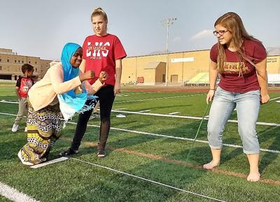 Running and reading combined in refugee support group