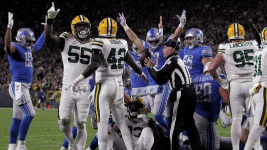 Packers get the calls, Crosby hits late FG to beat Lions