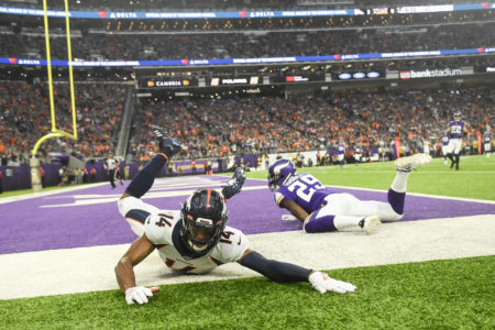 MINNEAPOLIS, MN - NOVEMBER 17: Courtland Sutton (14) of the Denver Broncos hits the turf after missing a catch, but drew defensive pass interference from Xavier Rhodes (29) of the Minnesota Vikings during the first quarter on Sunday, November 17, 2019. (Photo by AAron Ontiveroz/The Denver Post)