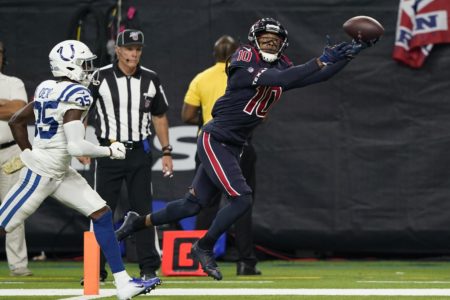 Houston Texans wide receiver DeAndre Hopkins (10) makes a touchdown catch past Indianapolis Colts cornerback Pierre Desir (35) during the second half of an NFL football game Thursday, Nov. 21, 2019, in Houston. (AP Photo/David J. Phillip) ORG XMIT: TXEG131