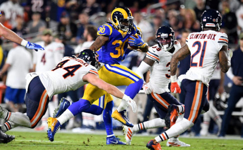 Running back Todd Gurley #30 of the Los Angeles Rams runs for a first down against the Chicago Bears in the first half of a NFL football game at the Los Angeles Memorial Coliseum on Sunday, November 17, 2018 in Los Angeles, California. (Photo by Keith Birmingham, Pasadena Star-News/SCNG)