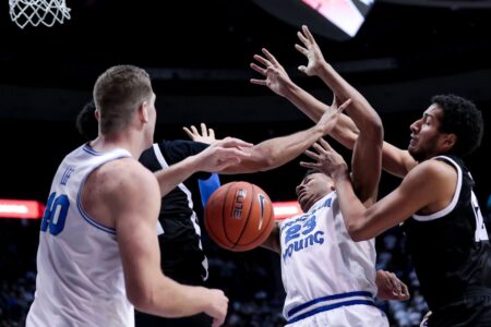 Toolson, Childs lead BYU over Nevada 75-42