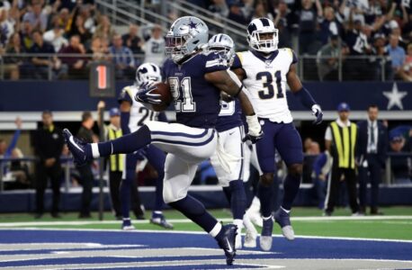 Cowboys render coin toss mix-up moot, throttle Rams 44-21